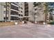 Exterior shot of building with well-maintained landscaping and easy access to the entrance at 13902 E Marina Dr # 111, Aurora, CO 80014