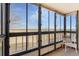Enclosed porch with expansive windows offering abundant natural light and beautiful views at 13902 E Marina Dr # 111, Aurora, CO 80014