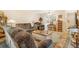 A cozy living room adjacent to the kitchen provides a comfortable and inviting space at 13902 E Marina Dr # 111, Aurora, CO 80014