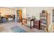 Spacious office area featuring natural light and convenient access to the living room at 13902 E Marina Dr # 111, Aurora, CO 80014