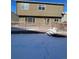 A spacious wooden back deck is covered in snow, leading to the house's rear entrance and backyard at 3610 Morning Glory Dr, Castle Rock, CO 80109