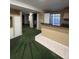 Finished basement with open layout, wet bar, and ample storage space at 3610 Morning Glory Dr, Castle Rock, CO 80109