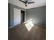 Bedroom with neutral carpeting, ceiling fan and closet at 3610 Morning Glory Dr, Castle Rock, CO 80109