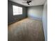 Bedroom with neutral carpeting and a window for natural light at 3610 Morning Glory Dr, Castle Rock, CO 80109