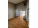 The living room features hardwood floors, and a view of the staircase leading to the upper level at 3610 Morning Glory Dr, Castle Rock, CO 80109