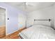 Bedroom features hardwood floors, closet and white color scheme at 21562 E 47Th Ave, Denver, CO 80249