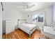 Bedroom with hardwood floors and a window allowing lots of natural light at 21562 E 47Th Ave, Denver, CO 80249