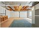 Spacious unfinished basement with exposed ceiling, white walls and potential for customization at 14025 Blue River Trl, Broomfield, CO 80023