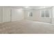 Spacious basement with two windows, offering natural light and potential for various uses at 14025 Blue River Trl, Broomfield, CO 80023