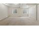 Basement featuring windows and a closet, offering storage and natural light at 14025 Blue River Trl, Broomfield, CO 80023