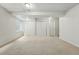 Large basement featuring neutral carpets, white walls, and plenty of storage space at 14025 Blue River Trl, Broomfield, CO 80023