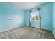 Inviting bedroom with light blue walls and gray carpet, creating a cozy and serene atmosphere at 14025 Blue River Trl, Broomfield, CO 80023