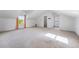 Large bonus room with neutral carpet and ample natural light from the windows at 14025 Blue River Trl, Broomfield, CO 80023