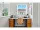 Upstairs landing with built-in desk and window, perfect for a home office or study area at 14025 Blue River Trl, Broomfield, CO 80023