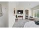 Bright main bedroom featuring ensuite bathroom and vaulted ceilings at 14025 Blue River Trl, Broomfield, CO 80023