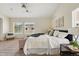 Spacious main bedroom featuring ceiling fan and an abundance of natural light at 14025 Blue River Trl, Broomfield, CO 80023