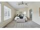 Bright main bedroom with ensuite bathroom and vaulted ceilings at 14025 Blue River Trl, Broomfield, CO 80023