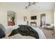Bright main bedroom featuring ensuite bathroom and vaulted ceilings at 14025 Blue River Trl, Broomfield, CO 80023