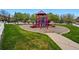 Community playground with slides, climbing structures, and a safe, open space for children at 14025 Blue River Trl, Broomfield, CO 80023