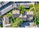 Aerial view of well maintained yards and multiple patios that are perfect for outdoor living and entertaining at 4273 W Ponds Cir, Littleton, CO 80123