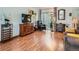 Bright living room with hardwood floors, a large window, and stylish furnishings at 4273 W Ponds Cir, Littleton, CO 80123