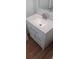 Modern bathroom showcasing a sleek vanity with a speckled countertop and brushed nickel fixtures, perfect for a contemporary home at 5319 Morning Glory Pl, Highlands Ranch, CO 80130