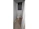 Powder bathroom features ceramic tile flooring at 5319 Morning Glory Pl, Highlands Ranch, CO 80130