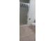 Bathroom featuring a toilet, and tiled glass-door shower at 5319 Morning Glory Pl, Highlands Ranch, CO 80130