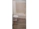 Bathtub with shower and tile surround at 5319 Morning Glory Pl, Highlands Ranch, CO 80130