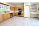 Well-lit kitchen featuring stainless steel appliances and light wood cabinets for a bright, airy feel at 3231 E 102Nd Pl, Thornton, CO 80229