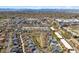 Expansive aerial view of a residential area with diverse housing and mountain views in the distance at 2831 Spruce St, Denver, CO 80238