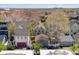 Aerial view of backyards with garages, trees, decks, and patios showcase a Gathering friendly community at 2831 Spruce St, Denver, CO 80238