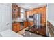 A well-equipped kitchen shows granite counters and stainless steel appliances at 2831 Spruce St, Denver, CO 80238