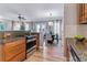 Open concept kitchen and dining area offer a seamless entertaining space at 2831 Spruce St, Denver, CO 80238
