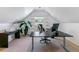 Contemporary office with dark desk, ergonomic chair, and natural light, perfect for productivity at 2831 Spruce St, Denver, CO 80238