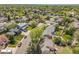 Aerial view of a residential neighborhood with tree-lined streets and well-maintained homes at 3653 E 133Rd Ct, Thornton, CO 80241