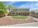 A spacious backyard with a patio area and lush landscaping, perfect for outdoor entertaining at 3653 E 133Rd Ct, Thornton, CO 80241