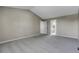 Bedroom with plush carpet, vaulted ceiling, and access to an ensuite bathroom at 3653 E 133Rd Ct, Thornton, CO 80241