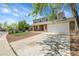 Charming two-story home with a brick facade, well-maintained lawn, and attached two car garage at 3653 E 133Rd Ct, Thornton, CO 80241