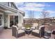 Backyard patio with a seating area around a fire pit, perfect for outdoor relaxation and gatherings at 5671 Raleigh Cir, Castle Rock, CO 80104