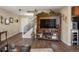 Open concept living room featuring stylish accents and hardwood floors at 5671 Raleigh Cir, Castle Rock, CO 80104
