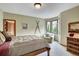 Inviting bedroom featuring a bay window, comfortable furniture, and a private ensuite at 322 Davis Ct, Breckenridge, CO 80424