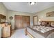 This bedroom features a closet with wood doors, natural light and neutral tones at 322 Davis Ct, Breckenridge, CO 80424