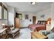 Cozy bedroom featuring a bed, chair, TV, and serene decor for a relaxing and inviting space at 322 Davis Ct, Breckenridge, CO 80424