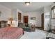 Comfortable bedroom with sofa and woven wall hanging, offering a relaxing and inviting atmosphere at 322 Davis Ct, Breckenridge, CO 80424