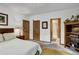 This bedroom provides ample space and two entryways, one leading to an ensuite bathroom at 322 Davis Ct, Breckenridge, CO 80424