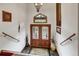 Entryway featuring decorative glass double doors and clerestory windows at 322 Davis Ct, Breckenridge, CO 80424