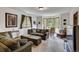 This living room boasts comfortable seating and natural light from the many windows at 322 Davis Ct, Breckenridge, CO 80424