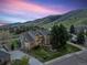 Two-story home with brick accents and mountain views at 87 Deerwood Dr, Littleton, CO 80127