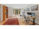 Bright office space featuring a large bay window and built-in shelving at 87 Deerwood Dr, Littleton, CO 80127